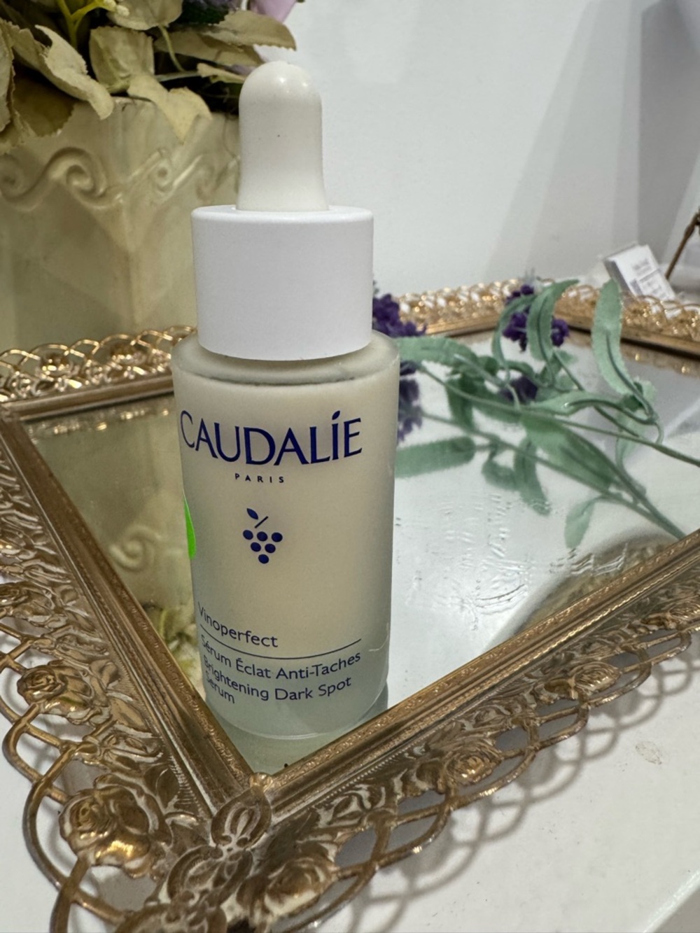 Caudalie Ivory and Navy Vinoperfect Brightening Serum Bottle